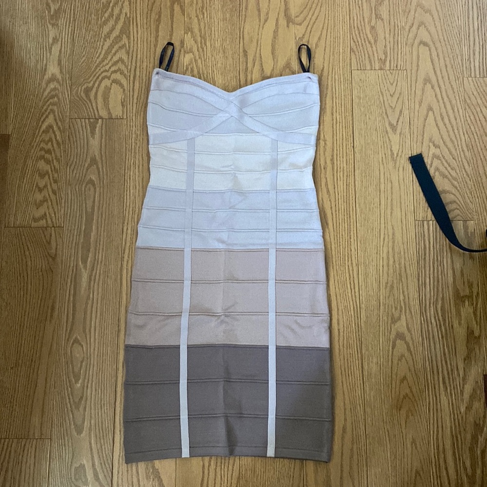 Bebe tube dress fits small and medium wear. In perfect condition
